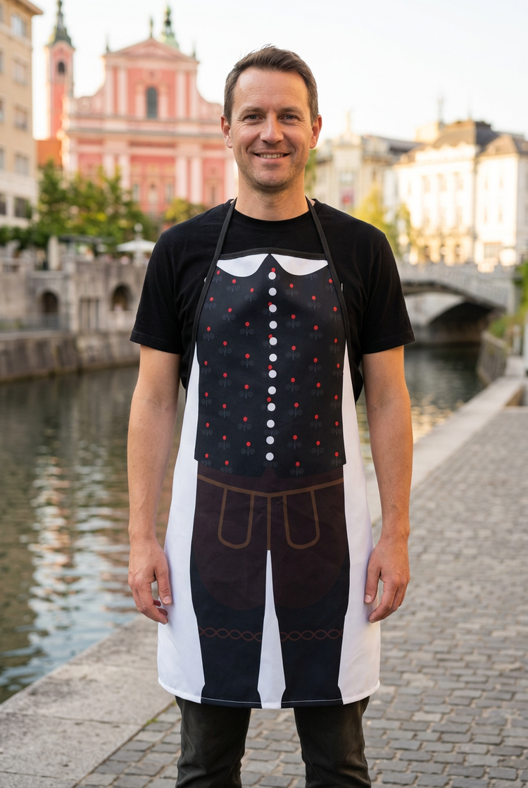 Man wearing the Slovenian noša apron with Ljubljana in the background