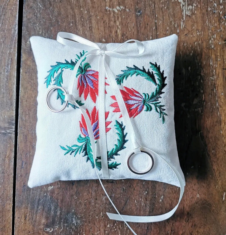 Handmade embroidered ring pillow from Slovenska Kuhinja Collection, inspired by Slovenian folk traditions.