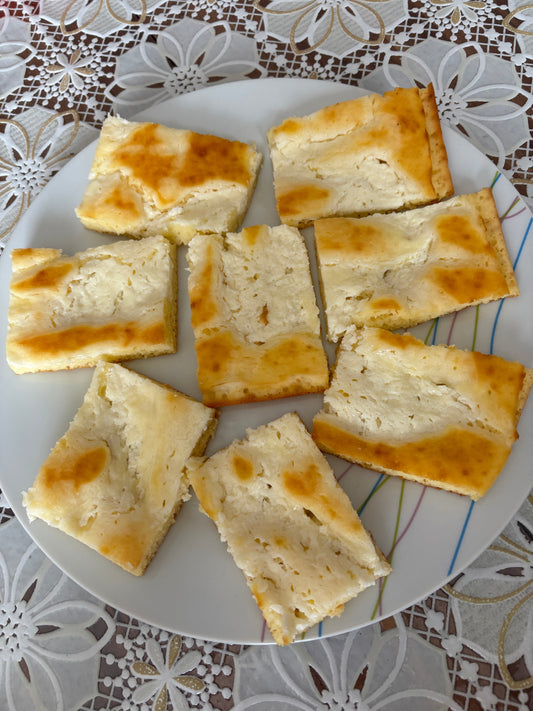 Traditional Prekmurska zlevanka Slovenian yogurt cake sliced and served on a plate