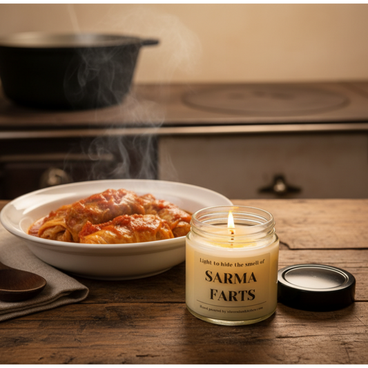 Sarma Candle with Cabbage Rolls on Rustic Table