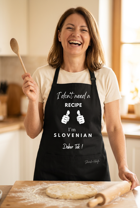 Slovenian apron on a cheerful home cook in a sunny kitchen